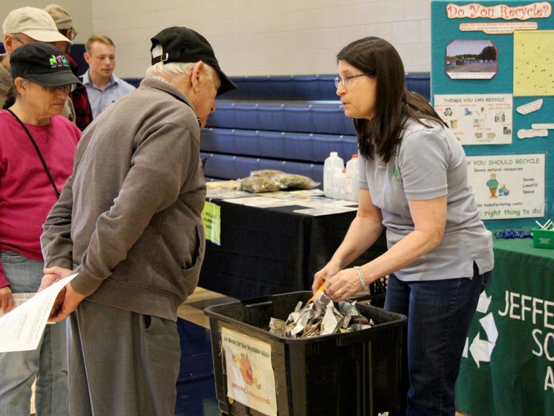 A representative from the Jefferson County Solid Waste Authority shares information, and demonstrates, important aspects of worm composting with community members in attendance at the Earth Day Celebration at Penn State DuBois.